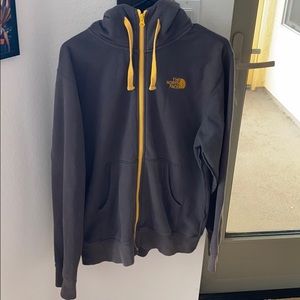 Grey and yellow Northface zip up jacket